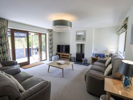 A living room with a coffee table and sofa at No 7 Ambleside