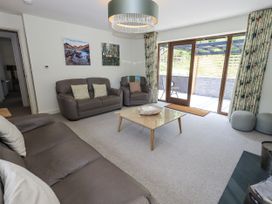 A living room with sofas and a coffee table at No 7 in Ambleside