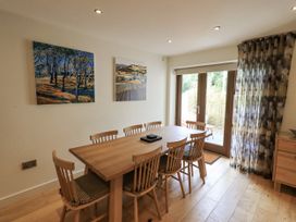 A dining room with a table and chairs at No 7 in Ambleside