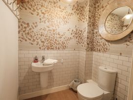 A bathroom with a sink and toilet at No 7 Ambleside