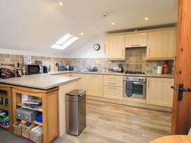 A kitchen with a countertop and appliances at High Dow Crag in Coniston
