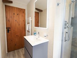 A bathroom with a sink and shower at High Dow Crag in Coniston