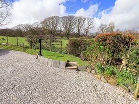 A garden area with gravel and steps at High Dow Crag in Coniston