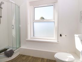 A bathroom with shower and toilet at Sunnymeade in Buxton, Norfolk