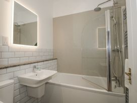 A bathroom with a bathtub and shower at The Park in Ludlow