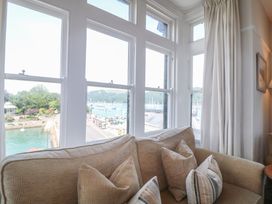 A living room with a view of the harbor at 2 York House in Dartmouth