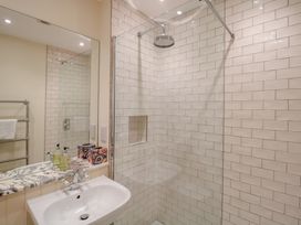 A bathroom with a shower and a sink at 2 York House Dartmouth