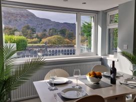 A dining room with a table set for a meal at Bryn in Bethesda