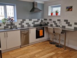 A kitchen with a sink and appliances at Bryn in Bethesda