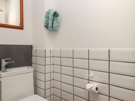 A bathroom with a sink and toilet at Dolphin Chalet in Dawlish Warren
