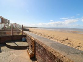 An outdoor space with a view of the beach and sea at Breaking Waves in Burnham-On-Sea