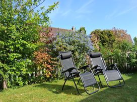 Two deck chairs in a garden at Crooked Well Timsbury, Nr Bath