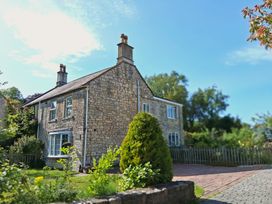 A house with a garden and pathway at Crooked Well in Timsbury, Nr Bath