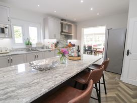 A kitchen with a countertop and sink at Pengwern in Llanrwst