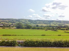 A view of hills and fields at Pengwern in Llanrwst