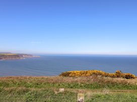 A coastal view overlooking the ocean and cliffs at Voebroch in Lythe