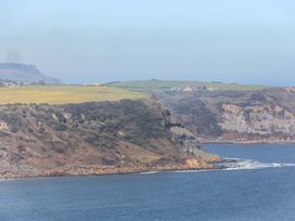 A view of coastline and cliffs near the sea at Voebroch in Lythe