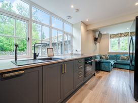 A kitchen with a sink and countertop at Home Farmhouse at the Graythwaite Estate near Hawkshead