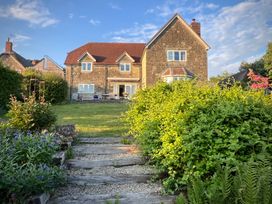 A house with garden and steps at Samstone in Donhead St. Mary near Ludwell
