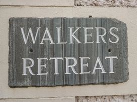 A sign with the text Walkers Retreat at Walkers Retreat in Keswick