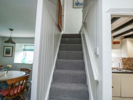 A staircase leading to an upper floor at 3 Rock Cottages Kingston