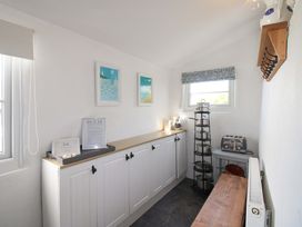 A kitchen with cupboard and toaster at 3 Rock Cottages Kingston