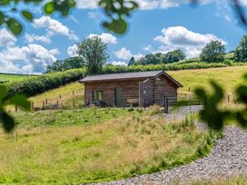 A cabin in a field at Birch Banc Retreats - Bedw Llanidloes