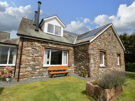 A house with stone walls and a garden at Sherriff, Troutbeck, near Keswick