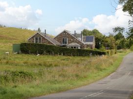 A house with solar panels near a road at Sherriff in Troutbeck, near Keswick