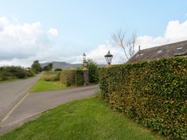 A view of a road and a hedge at Sherriff in Troutbeck, near Keswick