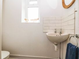 A bathroom with a sink and toilet at Afallon in Llanbedrog