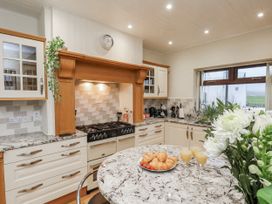 A kitchen with a stove and countertop at Beachcrest in Whitby