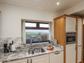 A kitchen with a sink and countertop at Beachcrest in Whitby