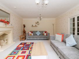 A living room with sofas and a coffee table at Raincliffe Manor in Scarborough
