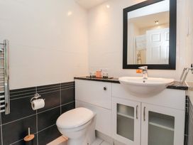 A bathroom with a sink and toilet at Raincliffe Manor in Scarborough