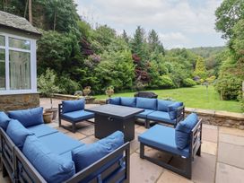 A garden with a seating area and plants at Raincliffe Manor in Scarborough