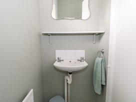 A bathroom with a sink and mirror at Churchfield House, Moygownagh near Crossmolina, County Mayo