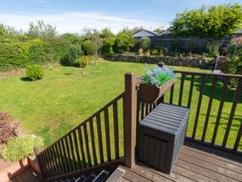 A garden view with a staircase and storage box at Garden View Apartment in Kingsbridge