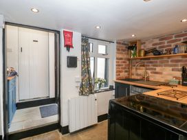 A kitchen with a window and countertop at Avonmede in Tewkesbury