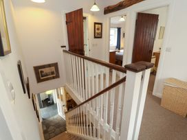 A staircase in a hallway at One Town End in Mungrisdale, Mosedale