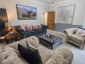 A living room with sofas and a coffee table at Red Screes in Ambleside