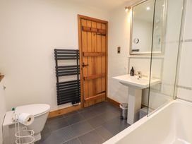 A bathroom with a sink and toilet at Fellside Cottage Bowness-On-Windermere
