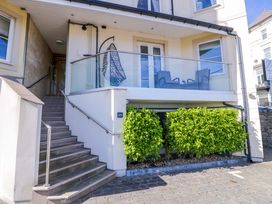 An outdoor area with stairs and a balcony at Ocean View Apartment in Colwyn Bay