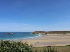 View of a beach with sand and sea at No 1 The Hinges Crantock