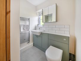 A bathroom with a sink and toilet at Tyn Y Ffynnon in Betws-Y-Coed