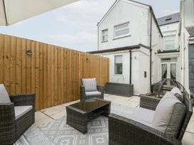 A garden with outdoor furniture at 76A Mackworth Road in Porthcawl