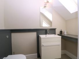 A bathroom with a sink and toilet at Thornbury, Barnard's Green, Malvern