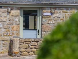 A door on a stone building at Scilly Stack in Penzance