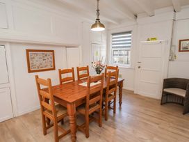 A dining room with a wooden table and chairs at The Anchorage in Whitby