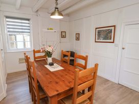 A dining room with a table and chairs at The Anchorage in Whitby
